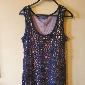 Black croquet minidress with shiny gold underlay